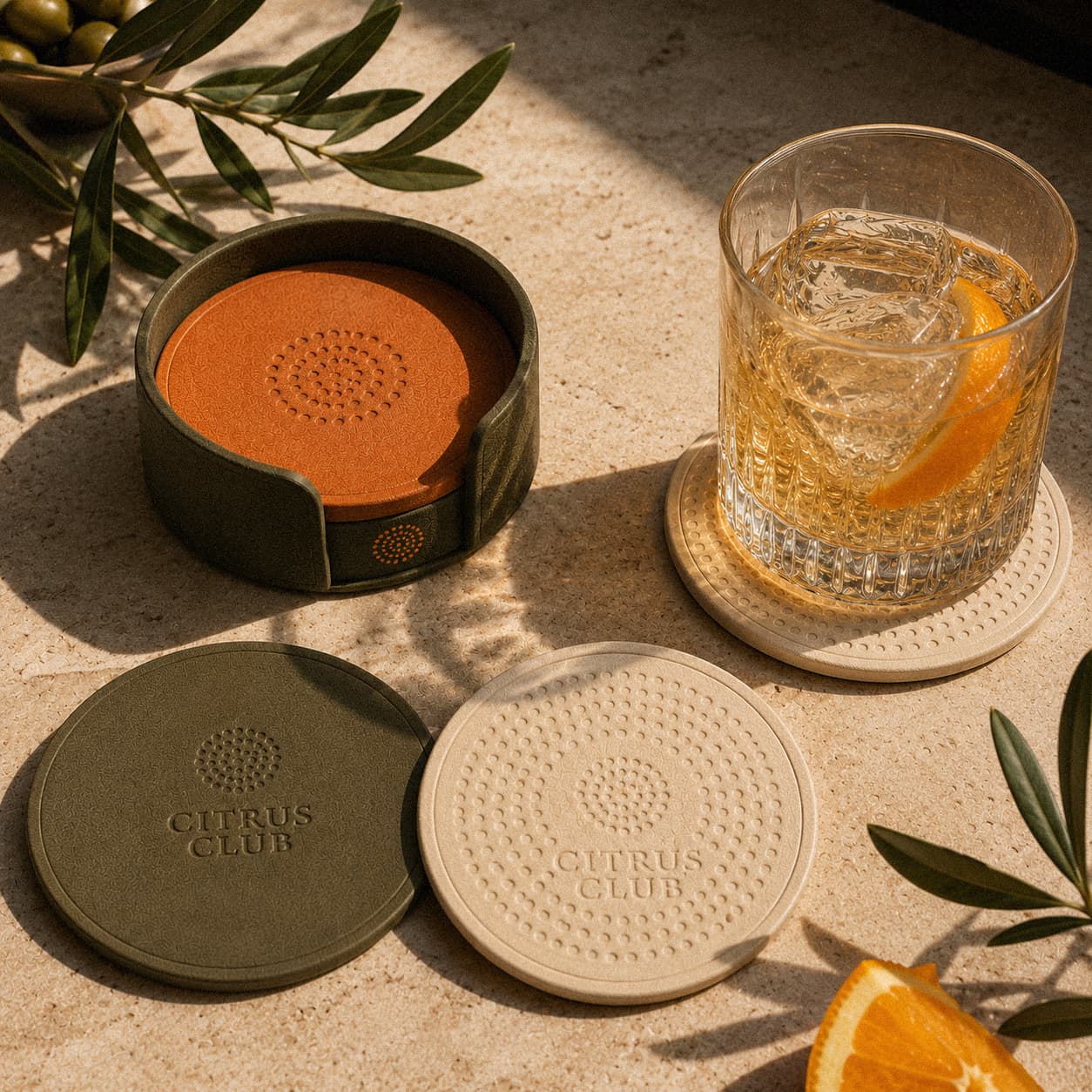 Citrus Club coasters and drink.
