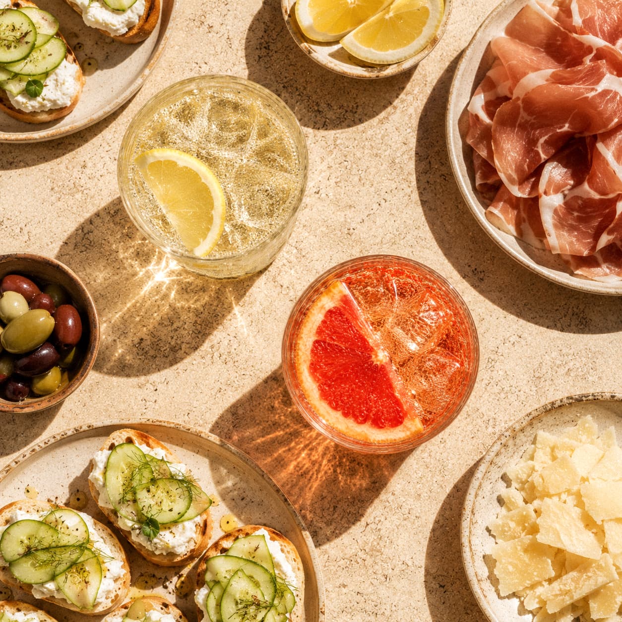 Citrus Club drinks and aperitivo food viewed from above.