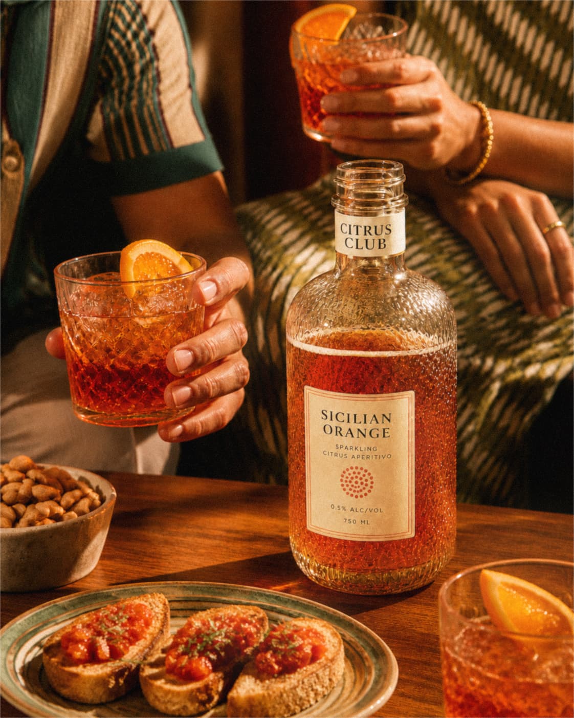 Sicilian Orange aperitivo shared at the table.