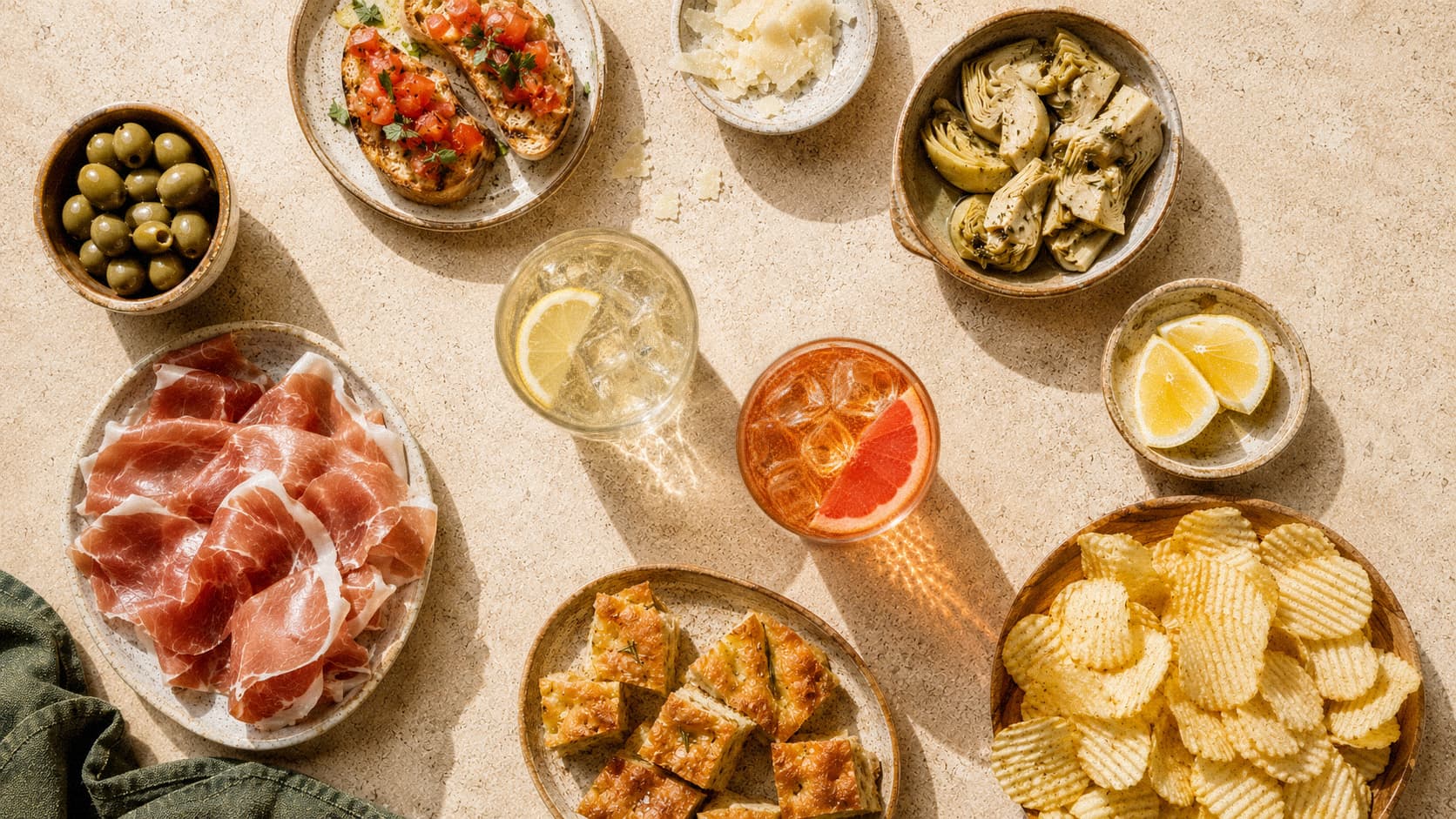 Aperitivo table with Citrus Club drinks, citrus and food.