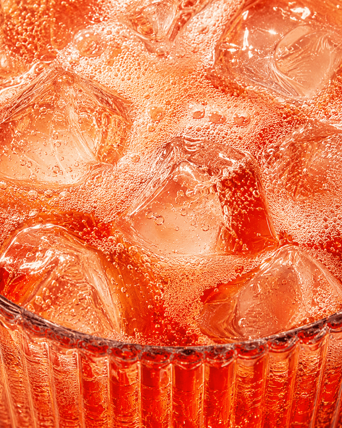 Ruby Grapefruit aperitivo, ice and effervescence in close detail.
